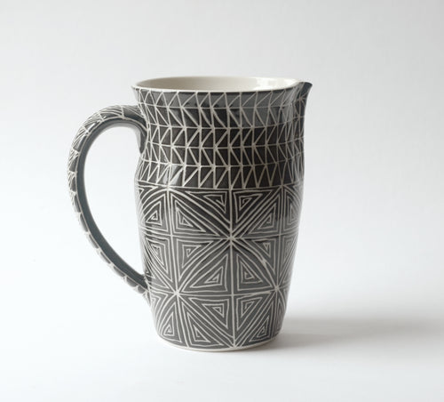 Carved Pitcher